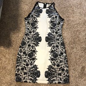 Very detailed black and white form fitting dress